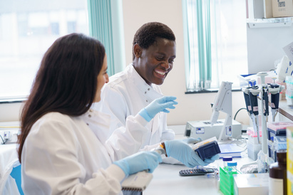 two scientists at the bench